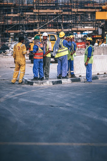 Photo of 7 male construction workers in PPE