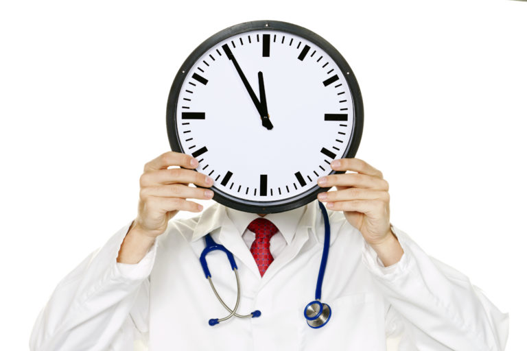 Colourbox1907980_a clock infront of a worker’ face