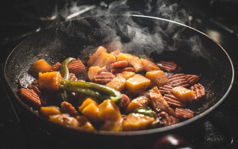 food cooking in a frying pan