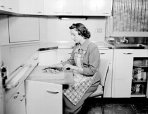 "Home economist chopping nuts, 1950" 