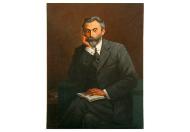 Ratan Jamsetji N. Tata (1871–1918) Oil painting of Ratan Jamsetji N. Tata sat holding a book