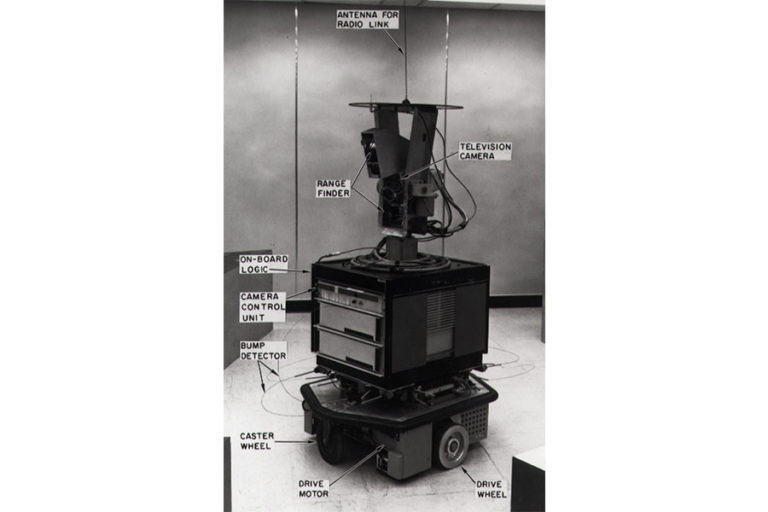 The Shakey mobile robot, with its TV camera, range finder and bump detectors labelled.