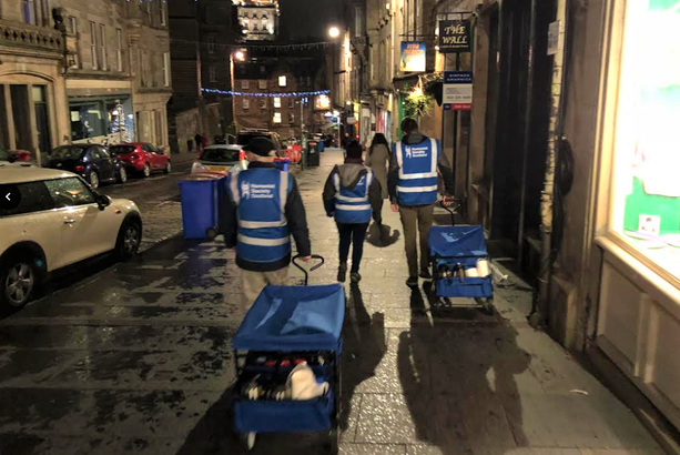 Humanist Society Scotland volunteers on a walk to deliver food and clothing to rough sleepers