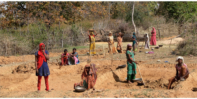 Women working on a road in India