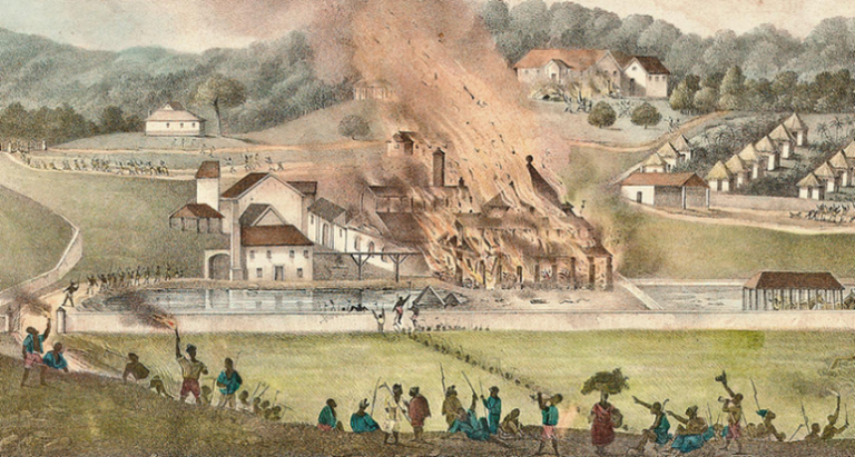 Depicts a set of buildings on a plantation on fire while enslaved people watch in the foreground