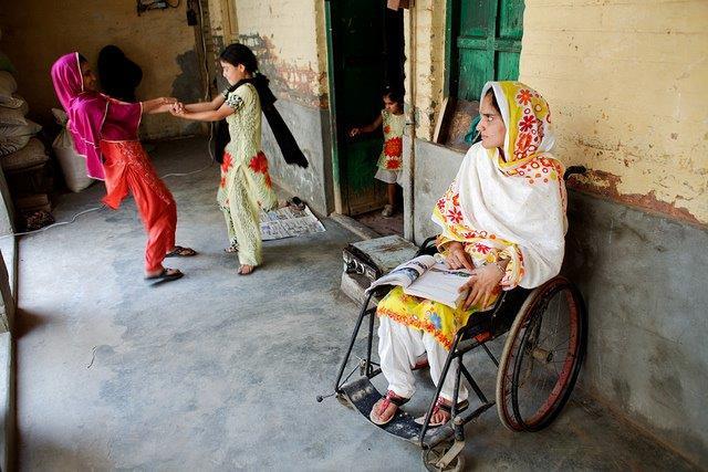 Woman sitting in a wheel chair