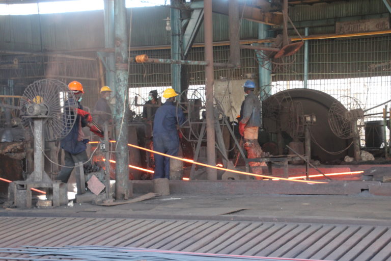 Handling of hot iron sticks