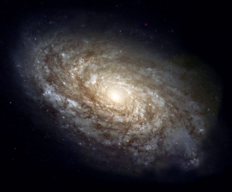 The dusty spiral galaxy NGC 4414 in full colour imaged by the Hubble Space Telescope
