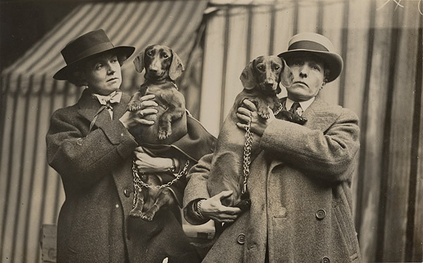 Radclyffe Hall (right) and Una Troubridge with their dachshcunds at Crufts dog show, February 1923 