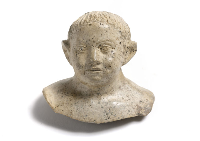 Bust of a child made from cream coloured ceramic