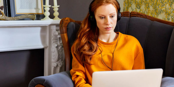 Woman uses her laptop