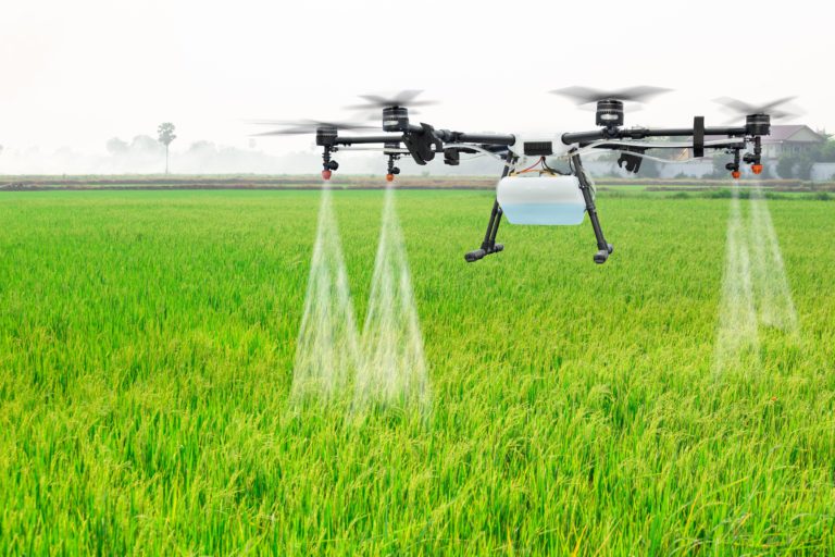 A drone flying over a crop