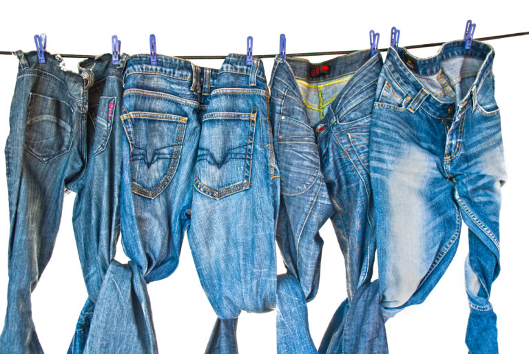 Blue jeans hanging on a clothesline