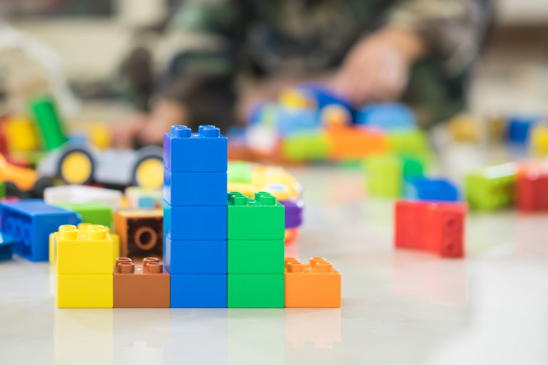 A stack of lego blocks, organised in give columns, demonstrating the vertical perspective