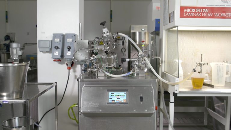 A pasteuriser in the Pilot Plant with apple juice being delivered to a jug