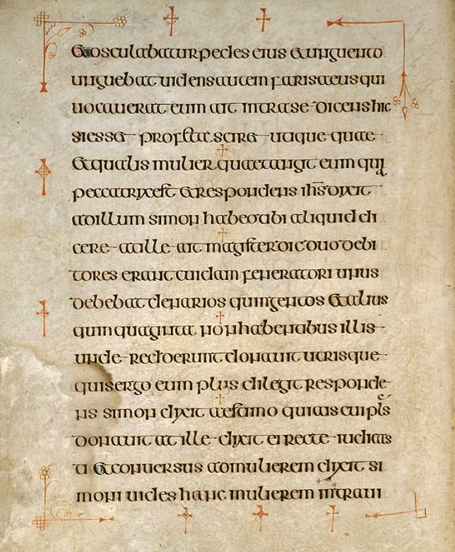 Figure 3, from the Book of Kells, a page of text framed by red crosses