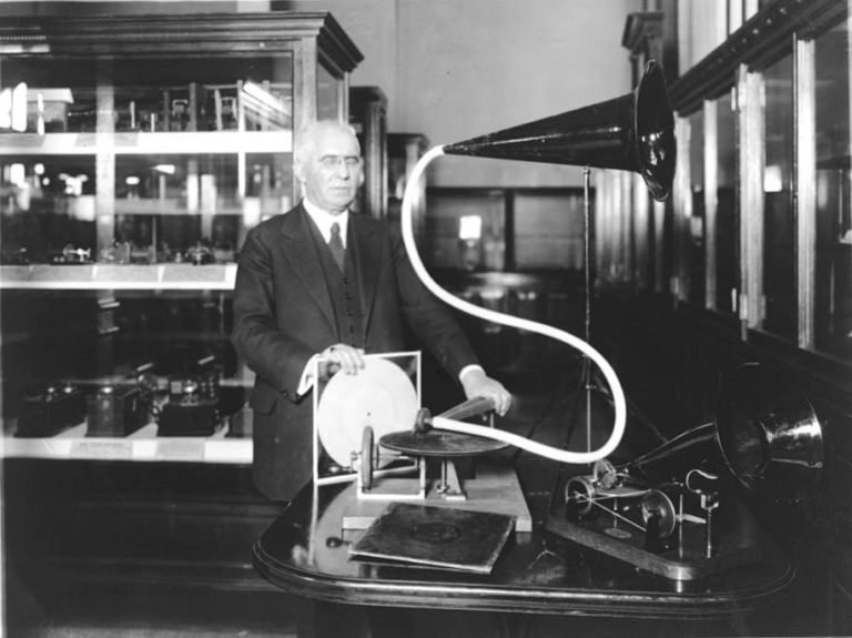 Emile Berliner, with the model of the first phonograph machine which he invented.