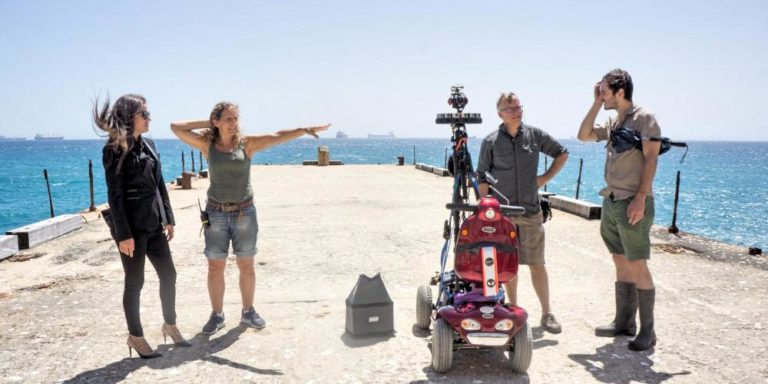 Mary Matheson blocks out a shot for The Female Planet with Inna Braverman