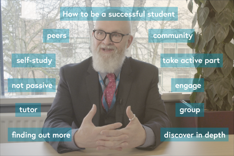 Ian Dunn wearing a suit and sat at a desk, surrounded by the following words and phrases: 'How to be a successful student', 'peers', 'community', 'self study', 'take active part', 'not passive', 'enagage', 'tutor', 'group', 'finding out more', 'dicover in depth'