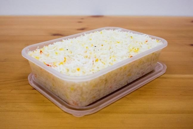 Photo of takeaway rice in plastic carton
