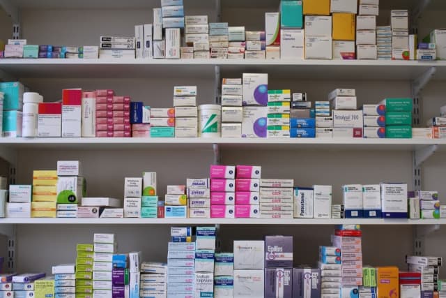 Shelves of drugs and medicine boxes