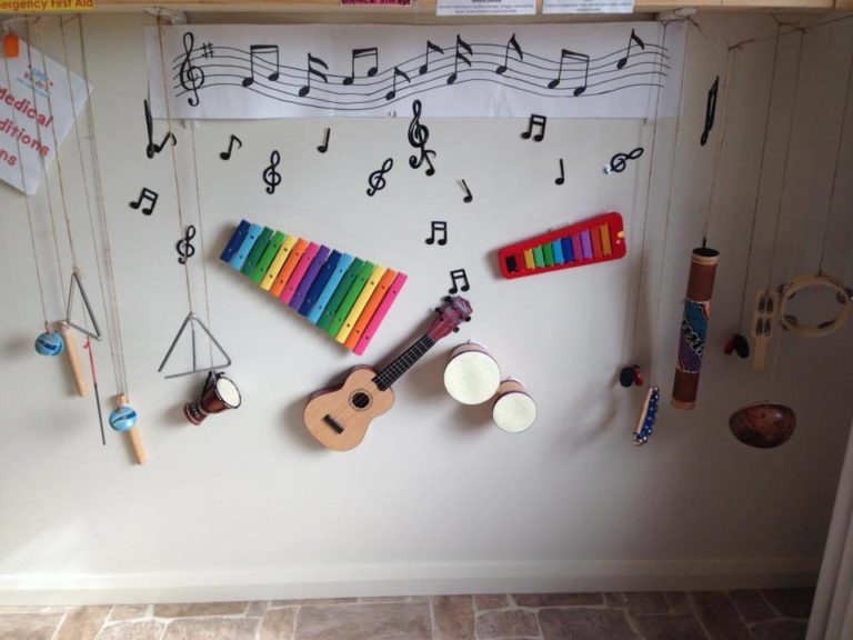 Photograph of a music wall of hanging instruments at an early childcare centre
