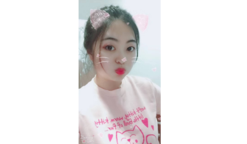 A selfie of a Chinese student edited by touch-up applications