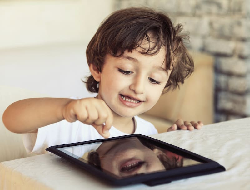 A child using an iPad