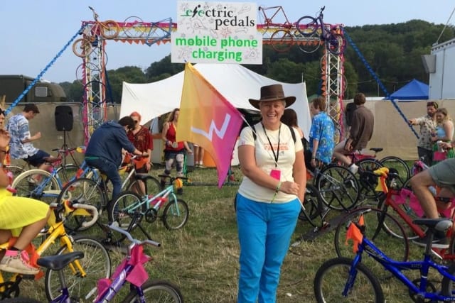 Madeline with the FutureLearn flag at Bestival