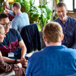 A group of professionals learn networking skills