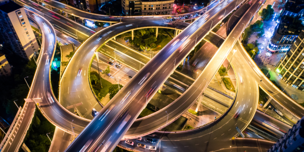 Road intersections lit up at night