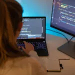 Woman learns coding at home