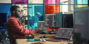 man working at computer