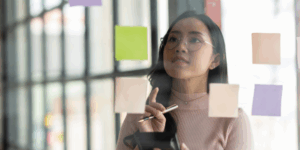 woman planning with sticky notes