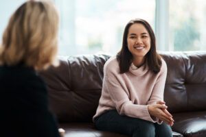 Shot of a person having a therapeutic session with a psychologist